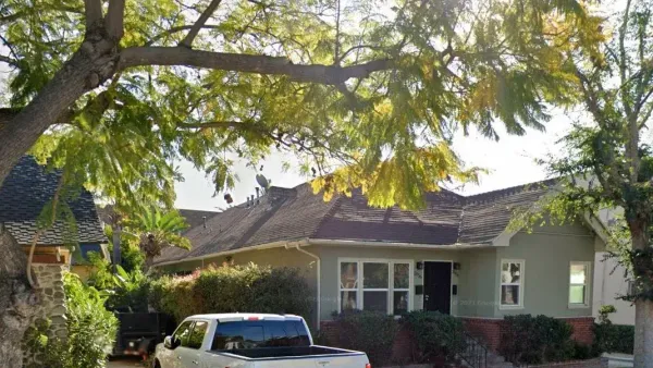 The 2600 block of South Magnolia is a festival of two-story Edwardians, each more magnificent than the last — a rare surviving streetscape of old Los Angeles. For now.