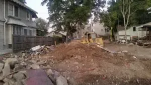 I had based my tale of 1238 on the application at Planning for the 36-unit that was being plopped on the site; the demo permit I linked to in the text was issued back in July. Was contacted by an